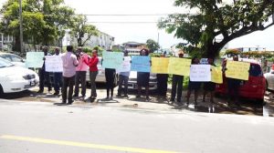 A section of the picketers in front of GTT’s Head Office on Brickdam. 
