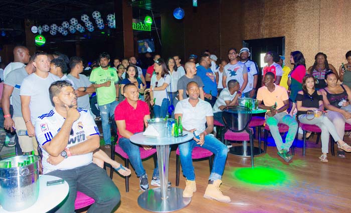 Football enthusiasts and patrons packed into the second floor of the 704 Bar and Lounge to get a glimpse of the Heineken UEFA Champions League Final last Saturday. (Yura Stephen photograph)