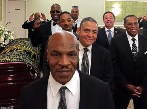 Pallbearers Tyson (front), Smith and Lewis (behind) are pictured prior to the ceremony as the world said farewell to a great.