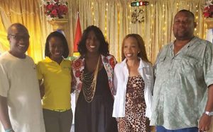 President of ST. Francis Alex Foster, RHTYSC Secretary/CEO Hilbert Foster poses with Lisa Punch, DR. Karis Munroe and Sonia Noel.