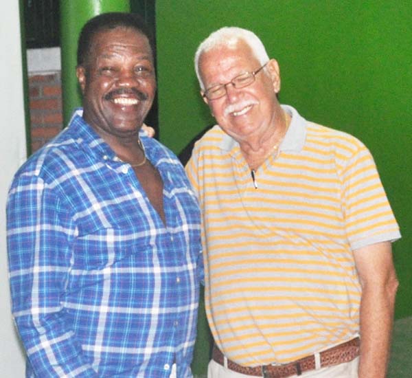 Reds Perreira (right) and local boxing Legend Lennox Blackmore at a previous event. 