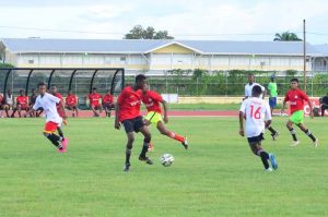 Part of the action in yesterday’s clash between eventual winners Soesdyke Secondary and Diamond at the Leonora Synthetic Track facility.