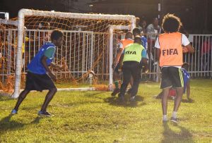 Queen’s Street scores in their clash against Ministry of Health on Friday night at the Parade ground.
