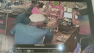 An image of the robbery taken from the CCTV footage