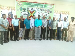 Minister of Business and Tourism Dominique Gaskin pose with member of the CCCC and the police at the launch of the Chamber 12 annual expo.  President of the CCCC Mohamed Raffik  at center