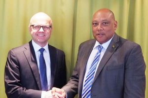 Norway’s Minister of Climate and Environment, Vidar Helgesen (left) with Guyana’s Minister of Natural Resources, Raphael Trotman.