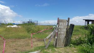 Signs of the times? -Nothing doing at the Turkeyen plot of land, East Coast Demerara.