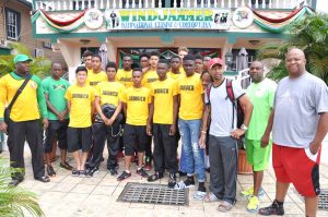 The Jamaican U16 Basketball Team and delegation pose for a photo opportunity at Windjammer International Hotel shortly after arriving in Guyana.