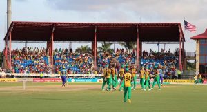 Rayad Emrit and his Amazon Warriors team-mates celebrate the wicket of Kyle Hope, Barbados Tridents v Guyana Amazon Warriors, CPL 2016, Lauderhill, July 28, 2016 © Peter Della Penna