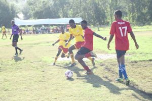 Part of the action between Tutorial and Berbice High School yesterday at Burnham Park in Berbice.