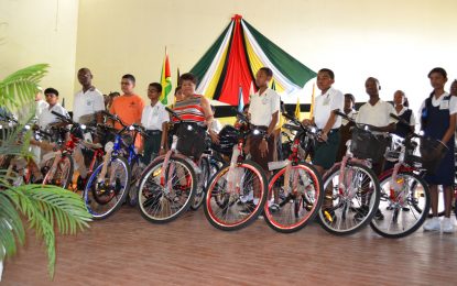 124 top NGSA students receive bicycles and backpacks