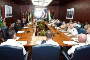 President David Granger and Chief of Staff of the Guyana Defence Force (GDF) in discussion  with the visiting Capstone team from the National Defense University, United States of America