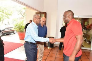 President David Granger greets Prime Minister Roosevelt Skerrit upon his arrival at the Pegasus Hotel 
