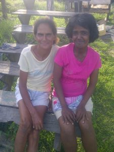 From left, Jennifer Monplaisir (suspect’s mother) and Vanessa Persaud Sukhram (suspect’s reputed wife) in happy times.