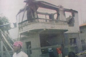 The burnt building in which the charred bodies were found