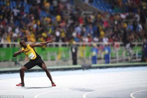 Bolt performs his trademark lightning bolt celebration after capturing the gold medal on Thursday night.