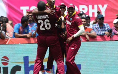 Lewis hundred, Bravo brilliance seals narrow Windies triumph