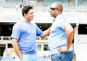  India coach Anil Kumble and West Indies coach Phil Simmons are engaged in conversation, West Indies v India, 4th Test, Port of Spain, 4th day, August 21, 2016 ©Associated Press