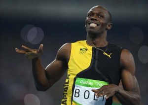 Jamaica’s Usain Bolt celebrates after he won the Men’s 100m Final during the athletics event at the Rio 2016 Olympic Games at the Olympic Stadium in Rio de Janeiro on August 14, 2016. (Photo: AFP)