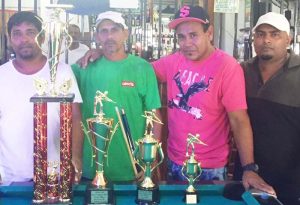 The winners pose with their trophies after the event: (from left) Gowkarran Mangru, David Odel, Clarence Baker and Steive Rafeek