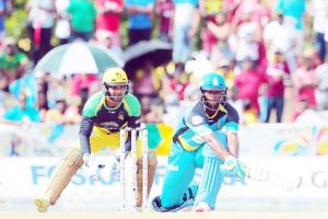 Johnson Charles reverse sweeps during his knock. (CPL)