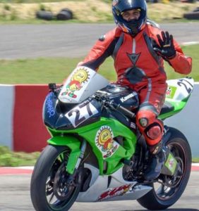 Guyana’s Superbike rider Stephen Vieira poses for a photo op.