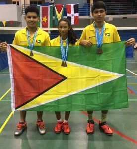 The three successful medal winners proudly display the Golden Arrowhead and their medals after the presentation.