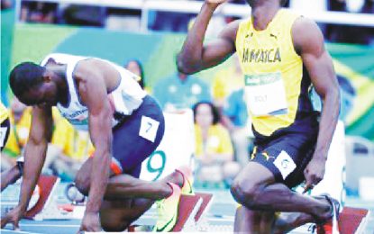 Usain Bolt wins  first-round 100 heat  in entertaining fashion