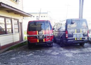 Two of the minibuses impounded at the Ruimveldt Police Station yesterday.