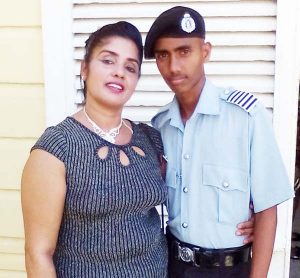 Constable Sham Kumar Persaud and his mother.