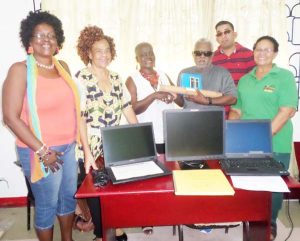 In photo (from left) Ms. Volda Bovell Hurst, Ms. Jennifer Conway, Ms. Norma Bovell, Mr. Cecil Morris, Mr Ganesh Singh and Ms Theresa Pemberton during yesterday’s donation.