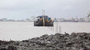 File photo: Work being done on the submarine power cable in the Demerara River.