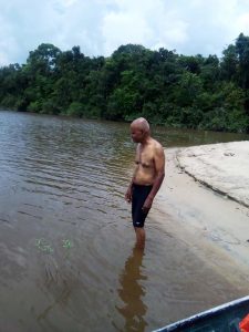 Ali about to enter the water of the Essequibo River.