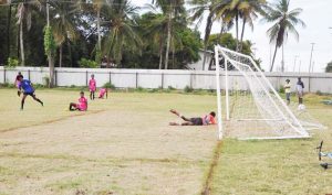 Bachelor’s Adventure Paradise SC’s Teshawn Gordon (2nd left) nets his sides opening goal against Buxton Stars yesterday at the Melanie ground, ECD.