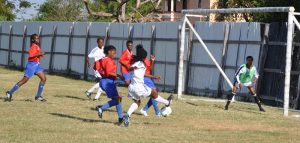 Demerara Queens (white) on the offensive against NA Warriors 