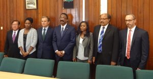 (Fourth from right) Minister of Legal Affairs Basil Williams flanked by members of his compliance team and officials from the FATF/ICRG inspection group
