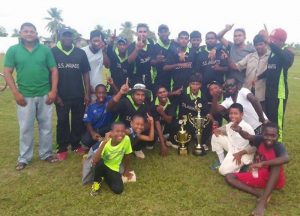 The victorious Sans Souci Jaguars team with their hardware. WCC secretary Nazeer Mohamed is at left.