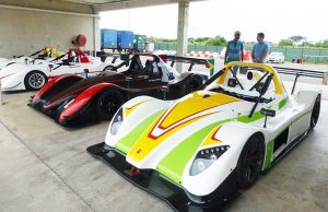 Suzuki motors to be used by Krisitan Jeffrey, Mark Vieira and Calvin Ming on display yesterday. (Bushy Park Barbados facebook)