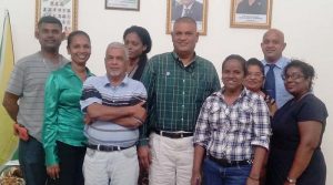 Regional Democratic Councillor and the Office of the Prime Minister Representative, Gobin Harbhajan (centre) with members of the Committee.