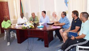 Minister of Education, Sport & Culture Dr. Rupert Roopnarine (3rd left) makes his presentation during the media briefing that Argentine Ambassador Luis Alberto Martino (4th left) held at the Embassy to introduce Coach Diego Giannantonio yesterday.