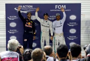 Red Bull’s Daniel Ricciardo of Australia, Mercedes’ Nico Rosberg (centre) of Germany and Mercedes’ Lewis Hamilton of Britain after the qualifying session. (Getty Images)