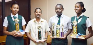 From left: Alecia Leander, Head Teacher Harrinarine, Renado Mars and Shadelle Washington.