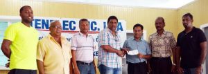 Bobby Deonarine, third from right hands over sponsorship cheque to BCB President Anil Beharry in the presence of other board members representatives of GCB.