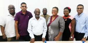 Minister Keith Scott (third from left) with the new board members of BIT.