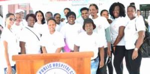 Participants of the walk-a-thon, pose for a photo with Minister within the Ministry of Public Health, Dr. Karen Cummings