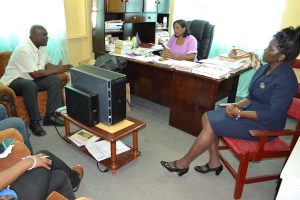 Chief Executive Officer of the eGovernment Agency, Mr. Floyd Levi met with the Regional Education Officer, Mrs. Baramdai Seepersaud (centre) to discuss the progress of the Secondary Schools Connectivity Project, which is part of the IDEAL programme.