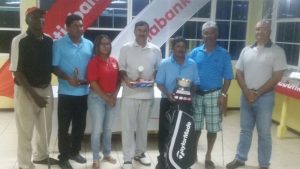 Winners pose with Marketing Manager Jennifer Cipriani (2nd from left) and Club President Oncar Ramroop (far right). Missing is Dr Philbert London. From left; Kalyan Tewari, Rabindranath Persaud, Mike Mangal and Hilbert Shields