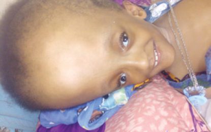 Seven-year-old with hydrocephalus clings to life