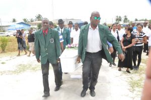 The body of the late Pritipaul George being taken to the cremation site. 