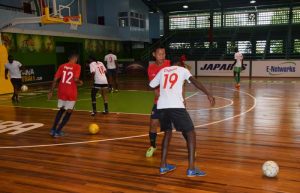Members of the Guyana futsal squad seen during a practice session yesterday at the Cliff Anderson Sports Hall.